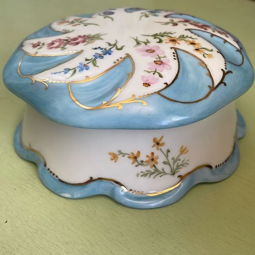 Vintage hand painted porcelain trinket box  by Jeanette Wriedt .